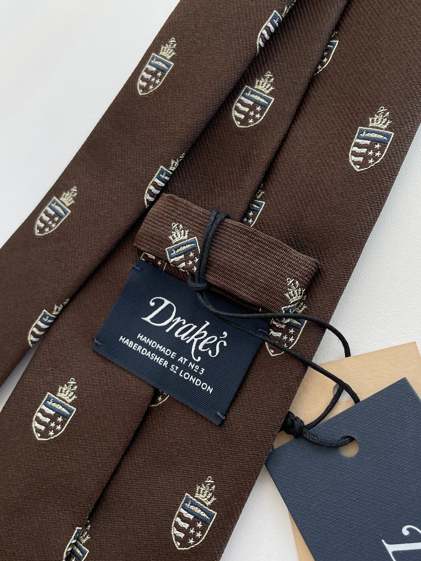 Drakes Salcombe Heraldic Silk Tie – Crowned Emblem in Chocolate Brown