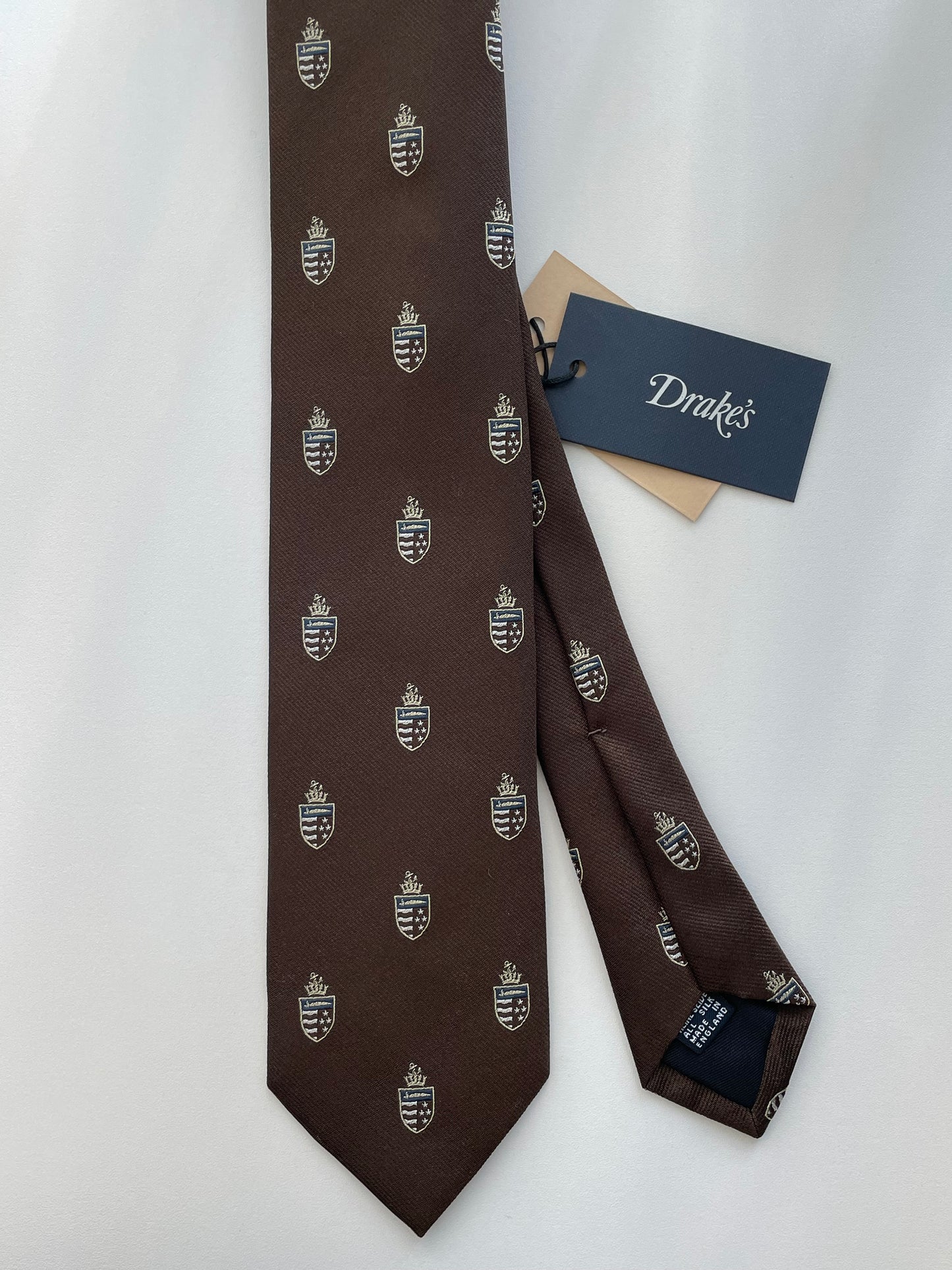 Drakes Salcombe Heraldic Silk Tie – Crowned Emblem in Chocolate Brown