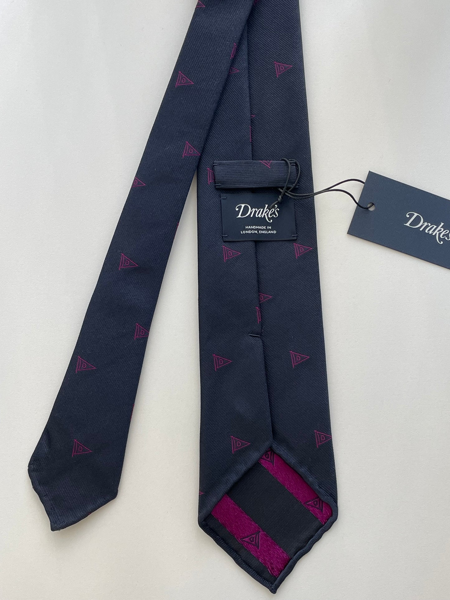 Drakes Logo Motif Navy And Pink Rolled-edge Handmade Silk Tie With Tag