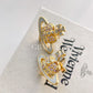 Vivienne Westwood Reverse Heart Studs Earrings Gold Blue and Violet crystal