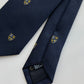 Drakes Navy Silk Tie with Crest Motif – A Touch of British Heritage