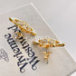 Vivienne Westwood Reverse Heart Studs Earrings Gold Blue and Violet crystal