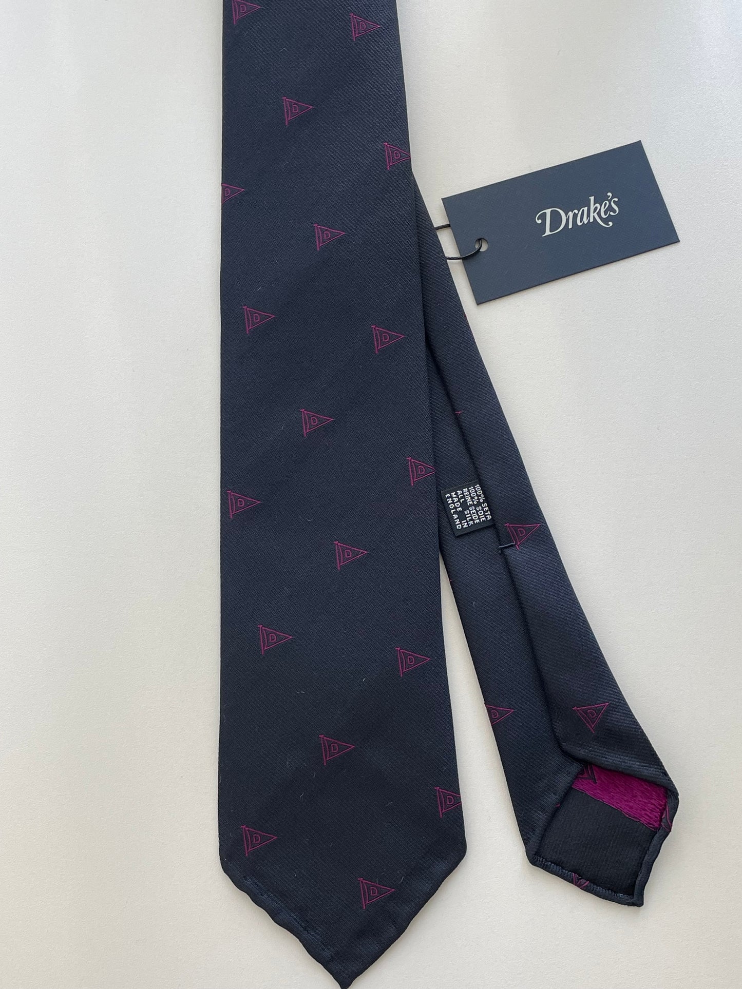 Drakes Logo Motif Navy And Pink Rolled-edge Handmade Silk Tie With Tag