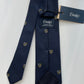 Drakes Navy Silk Tie with Crest Motif – A Touch of British Heritage